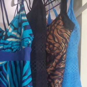 Tropical Escape Blue, Black, and Brown One Piece Swimsuits